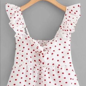 Red and white polka dot top